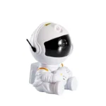 astronaut projekcija zvezde i maglina